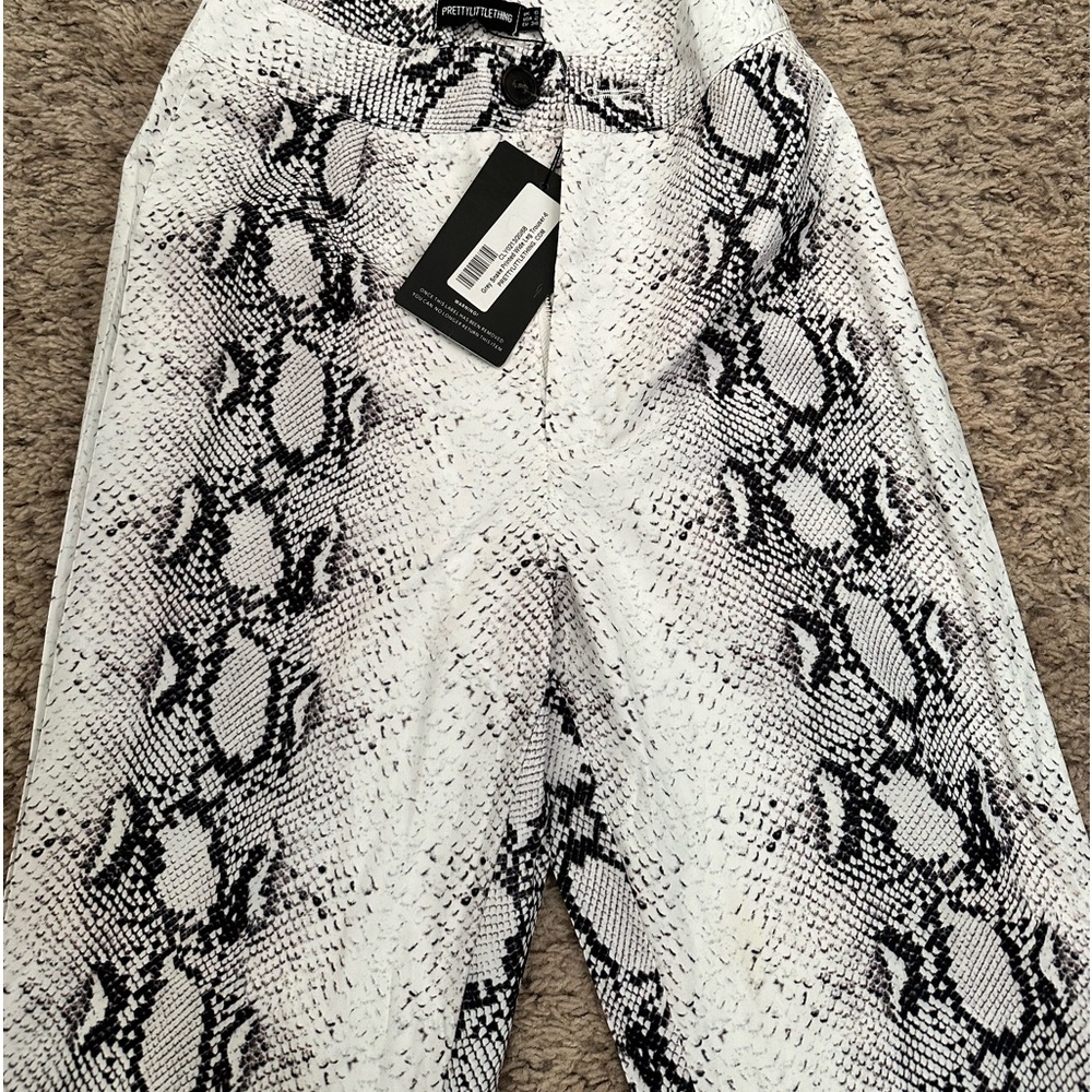 NEVER WORN SNAKE PANTS